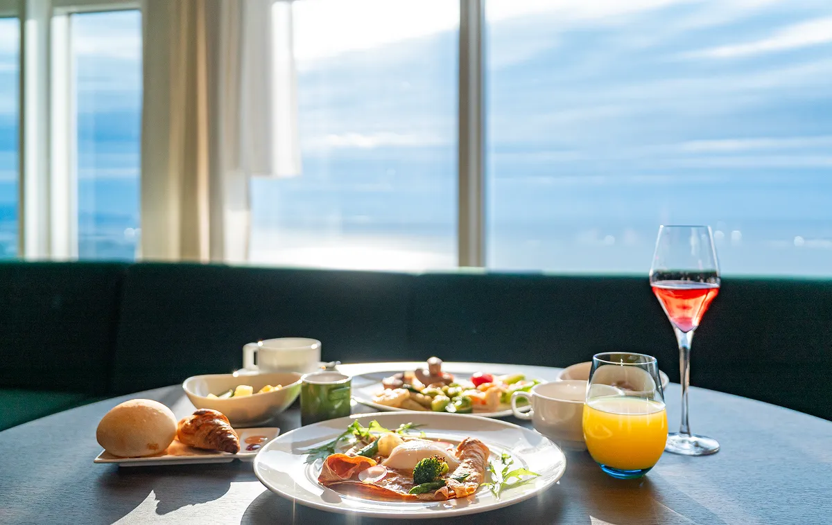 Breakfast at a table overlooking the sea