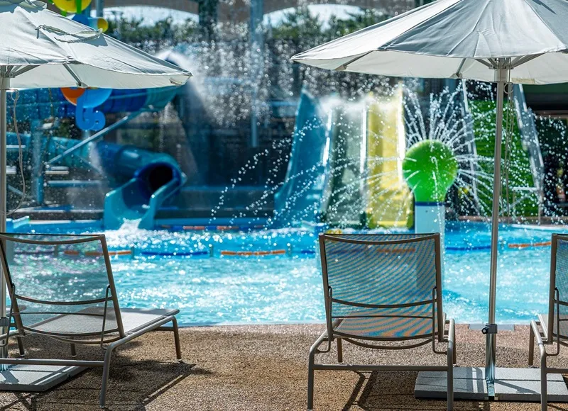 CG rendering of the completed water slide and waterfall in the splash area.