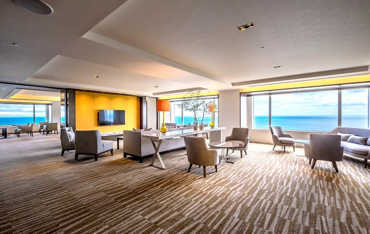 Interior view of the club lounge overlooking the sea
